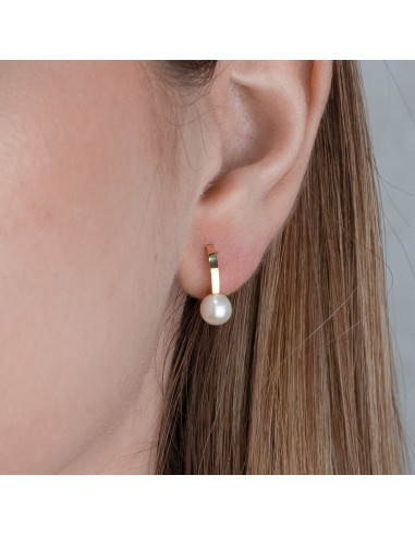 Pendientes Perla Radiante: Elegancia atemporal en cada brillo