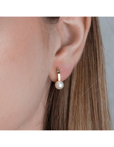 Pendientes Perla Radiante: Elegancia atemporal en cada brillo