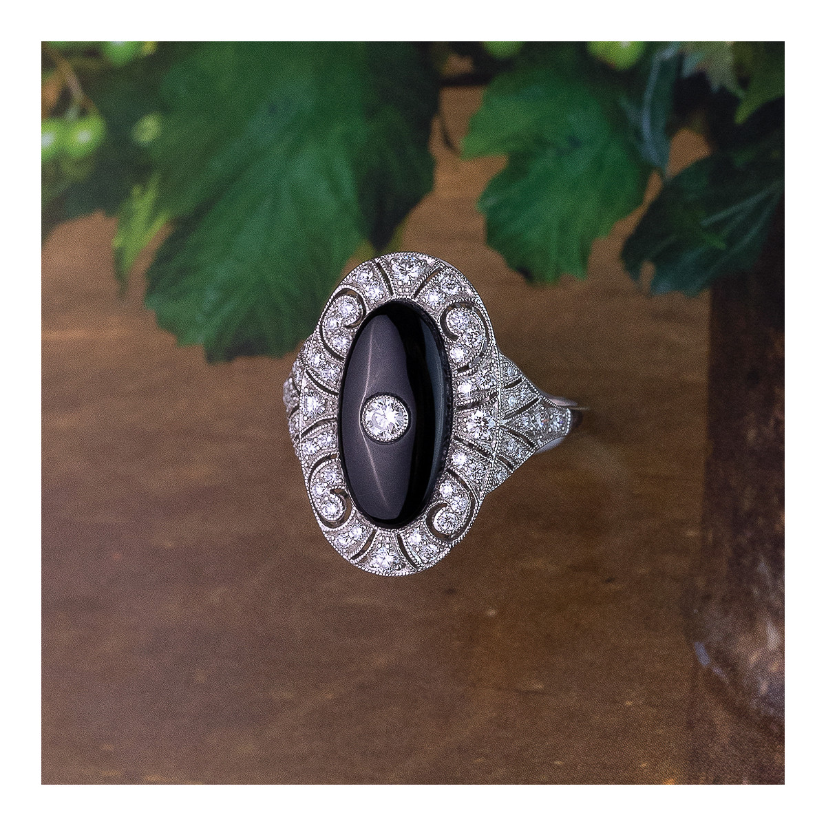 ONYX OVAL RING AND DIAMONDS