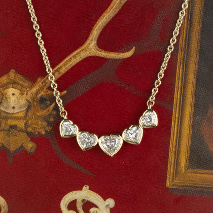YELLOW GOLD NECKLACE WITH DIAMOND HEARTS