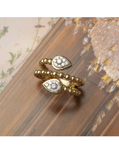 Gold ring with teardrop-shaped diamonds at the ends