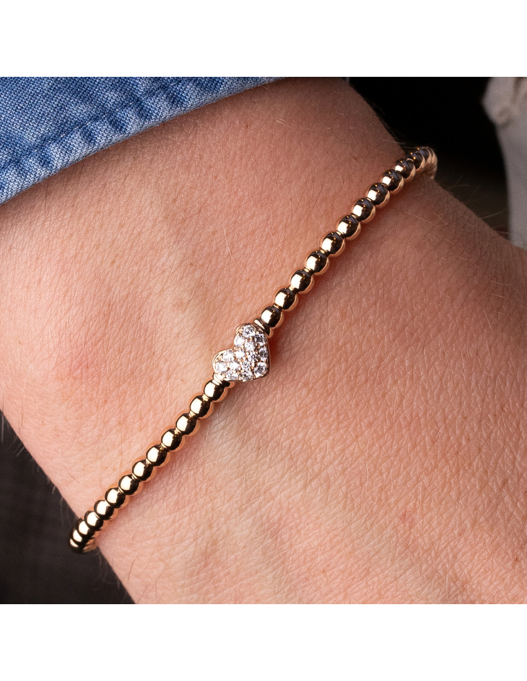 Pulsera elástica de oro con corazón de diamantes – Amor y elegancia