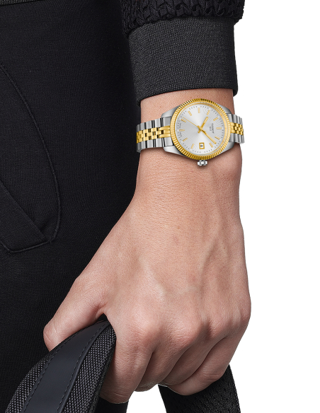 Tissot Two-Tone Bisel Estriado - Reloj Elegante y Versátil