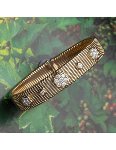 Brazalete Tubogas oro 18Kt con diamantes florales | PR Joyeros